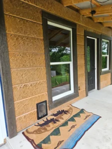 image of hand hewn siding on barndominum
